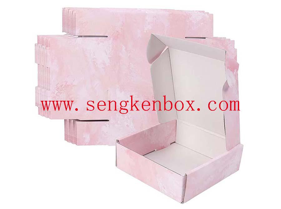 Roze opvouwbare papieren kaartdoos